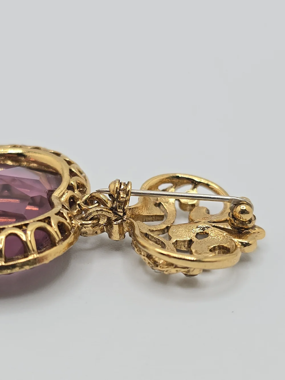 Vintage Purple Crystal Heart Brooch Rhinestone Gold Tone Articulated 2.25
